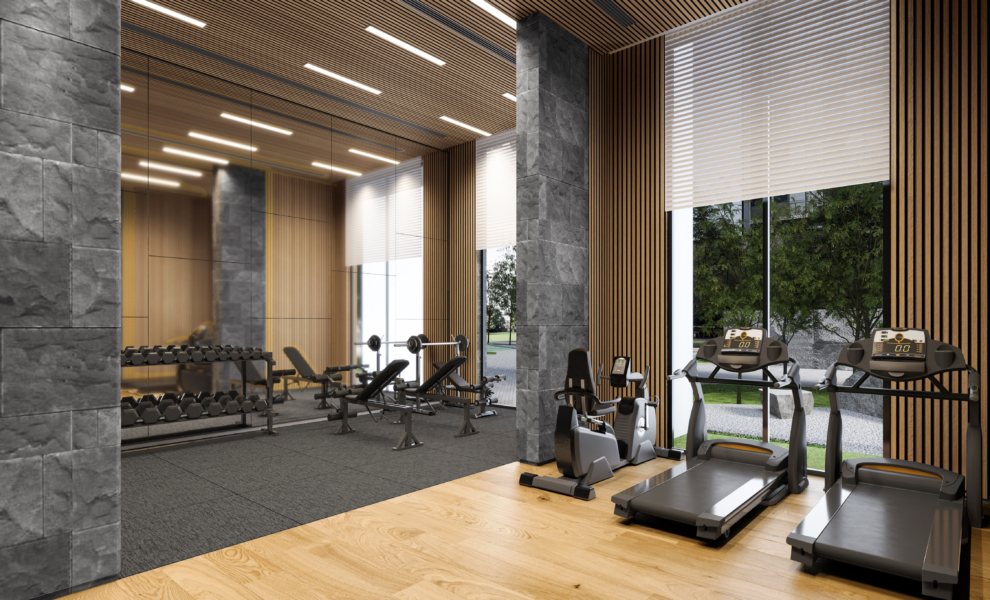Gym equipment arranged neatly in a spacious, well-lit room_brandestate.in