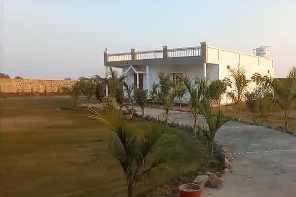 A luxurious farmhouse in Vatika Farms, Sohna, offering serene and spacious living in the heart of nature_brandestate.in